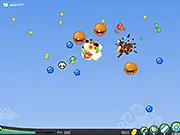 Death vs Monstars 2 game screenshot, a character shooting a gun at a group of cartoon monsters while collecting falling coins