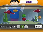 Colorful fish swimming in a digital aquarium in the Aquarium Fish Count educational game for kids