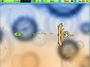 Survivolution online game screenshot showing the organism Slib swimming and shooting microscopic enemies in the primordial ooze environment.