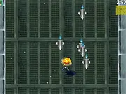 The main character, Snake, narrowly evading multiple homing missiles in the online arcade game MGS Missile Evation