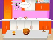 Virtual Halloween Pumpkin Maker game showing a finished carved jack-o'-lantern with a spooky face