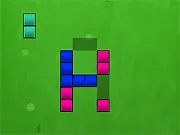 Enigma free online puzzle game screenshot showing a grid of connected blocks being slid to form a shadowed image