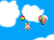 The Easter Bunny character being launched high into the sky, collecting colorful Easter Eggs for a power boost, with stars and outer space visible in the background. Play this free online adventure game.