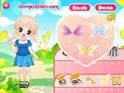 Magic Fairy Dress Up game screenshot showing a fairy with colorful wings and cute clothes, playing a free online makeover game