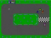 Gameplay screenshot of Battle Kartz, showing go-karts racing closely on a colorful track, with one kart aggressively pushing another.