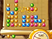Super Alchemy online game screenshot showing colorful gems and wizard hat power-ups