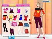 The Tanya Girl Dressup game screen showing the girl, Tanya, styled in a fashionable outfit, placed against one of the game's customizable backgrounds, with the wardrobe and background options visible on the sides.