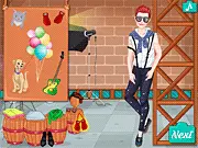 Screenshot of the Bradley Fashion Magazine game showing the male model Bradley dressed in a stylish suit ready for a magazine cover, a free online dress-up game.