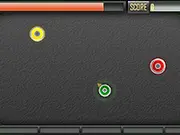 Gameplay screenshot of Green It 2: Nitro Blast, showing a fast-moving green object dodging multiple enemies and collecting glowing power-ups on screen