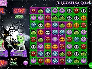 Elsa and Anna Halloween Match It game screen showing pairs of spooky symbols and colored tiles in a memory puzzle