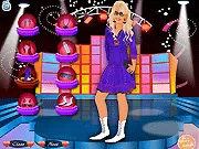 The Popstar model wearing a dazzling stage outfit in the Popstar Dressup game, play free online fashion game on PlayArcadeHub