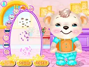 Screenshot of Cute Bear Salon game, a teddy bear being dressed up in a cute outfit, free online dress-up game for kids