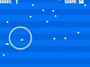 Screenshot of Dot Blocker game showing numerous colored dots falling and a large explosion from a nuke power-up.