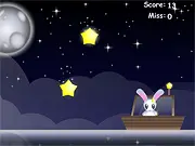 Catch A Falling Star free online game screenshot showing a collector catching twinkling yellow stars against a dark blue night sky on PlayArcadeHub