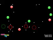 Atomos circular puzzle game screenshot showing a ring of colorful atoms ready for a fusion chain reaction; Play Atomos free puzzle online