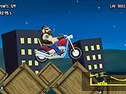 Silent Rider motorcycle game screenshot showing a motorcyclist balancing on a rocky, challenging terrain course under a night sky; Play Silent Rider free motorcycle stunt game