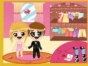 Kids Couple Dress Up free online game screenshot showing an adorable boy and girl couple wearing matching stylish outfits.