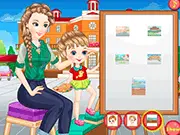Mother and daughter posing in stylish, matching outfits with a colorful painting palette and paintbrush