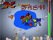 Screenshot of the X-treme Tugboating game showing a small blue tugboat circling a tiny planet, using its crane to grab brightly colored fish.