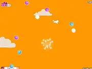 Screenshot of the Summer Wool game, showing a cute cartoon kitten collecting a ball of yarn on a grassy hill.