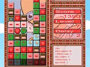 Valentine Blocks game screenshot, a grid of pink and red Valentine symbols like hearts and flowers, free online match-3 puzzle game
