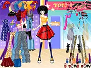 The Yojo Star Dress Up free online game interface showing a glamorous female celebrity character surrounded by clothing, jewelry, and accessories.