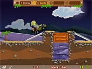 Magic Safari 2 game screenshot showing a cartoon zombie riding a vehicle through a colorful physics puzzle course.
