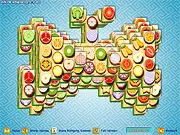 The free online puzzle game Butterfly Mahjong showing fruit tiles arranged in a symmetrical butterfly shape.