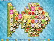 The free online puzzle game Fish Mahjong showing a board layout of fruit-themed tiles in an aquatic setting.
