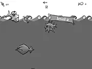 Fish Raider free arcade game screenshot showing a player character collecting light bubbles while dodging enemy fish