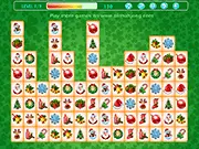 Christmas Links game screenshot, a grid of festive tiles being connected by a line, play free online puzzle game