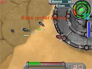 Gameplay screenshot of the Core Defense online game showing the power core, defense vehicle, and enemy waves.