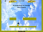 Screenshot of the Greenator puzzle game showing a mix of blue, yellow, and green balls on a board with physics mechanisms
