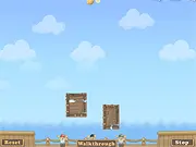 Screenshot of the Bombardius game showing a wooden structure successfully shielding a small ship from a falling bomb