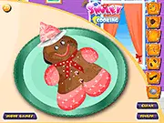 Ginger Bread Decoration free online baking game featuring a gingerbread man cookie covered in colorful icing and delicious toppings
