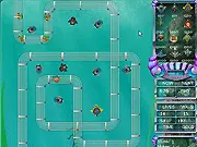 Screenshot of the free online game Underwater Tower Defense showing turrets defending a path against a school of attacking fish.