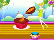 Screenshot of Happy Fairy Cupcake game showing a finished, decorated cupcake with colorful frosting and fairy-themed toppings