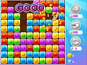 Pop Candies match-3 game screenshot showing colorful candy icons and several decorated, upgraded stars on the puzzle board.