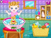 Screenshot of Baby Washing Her Toys free game, showing a baby character cleaning a stuffed animal with soap and water