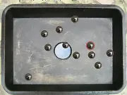 Don't Drop the Ball free arcade game screenshot, balls rolling around a hole that the player must avoid, physics-based online game