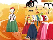 Screenshot of Maralah Asian Dressup game showing the character Maralah wearing an elaborate traditional Asian dress with unique jewelry, fashion styling free online game.