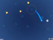 Screenshot of Swingy Ball online game showing a small ball swinging from a pivot point, attempting to collect a glowing yellow object