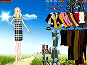 Screenshot of Sydney Dressup online game showing a tall girl character with long legs standing in a selection of stylish sweaters and layered clothing options