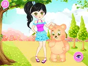 The girl and her teddy bear dressed up in matching outfits in the Bear and Me free online dress up and customization game