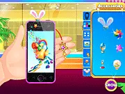 A screenshot from Decor Your Mobile Lovely, displaying a mobile phone being customized with colorful accessories, stickers, and a decorative phone case.
