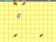 Gameplay screenshot of the free online arcade game The Cheese Hunter, showing the mouse Squeaky collecting cheese while avoiding traps on a surface.