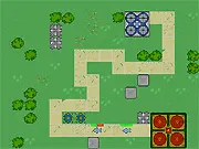 Screenshot of Earth Tower Defense game showing various turrets placed strategically around a corner on the map path to damage approaching enemies, play free online