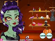 Halloween Creepy Makeover free online game screenshot featuring dramatic face makeup and spooky accessories