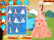 Autumn Wedding Dress Up game, bride in white gown under red trees, free online fashion game
