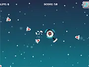 Space Base Defender free online game screen showing a base defending itself against attacking enemy rocket ships and collecting stars